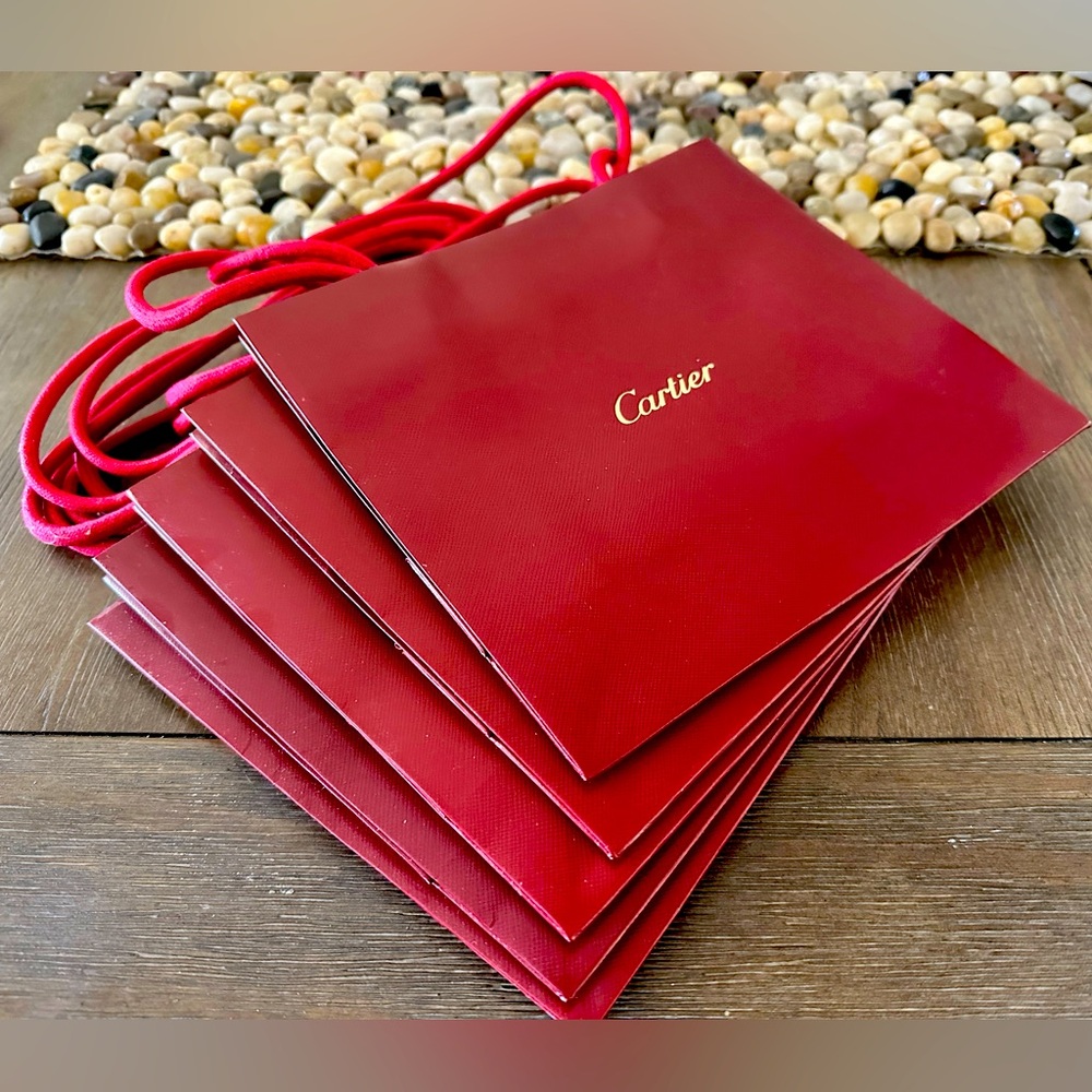 Lot of 5 Authentic Cartier Shopping Bags.
